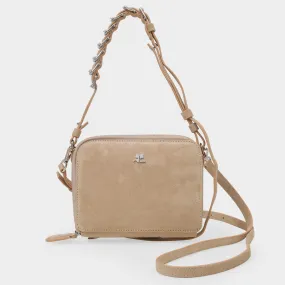 Courreges  Mirror Pochette Bag in Beige Leather