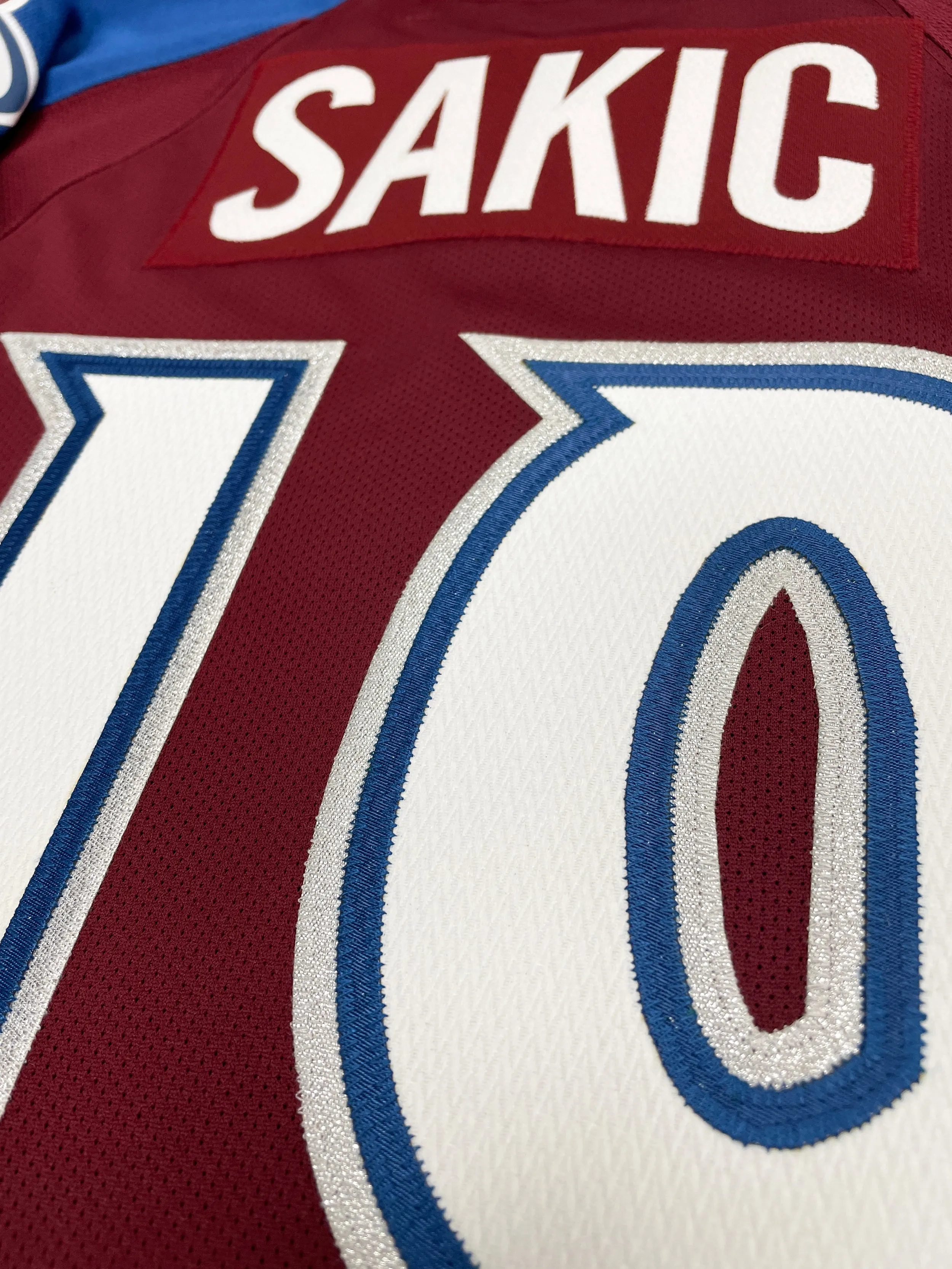   JOE SAKIC COLORADO AVALANCHE HOME PREMIER REEBOK NHL JERSEY